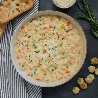 Overhead view of a bowl of Tuscan White Bean Soup.