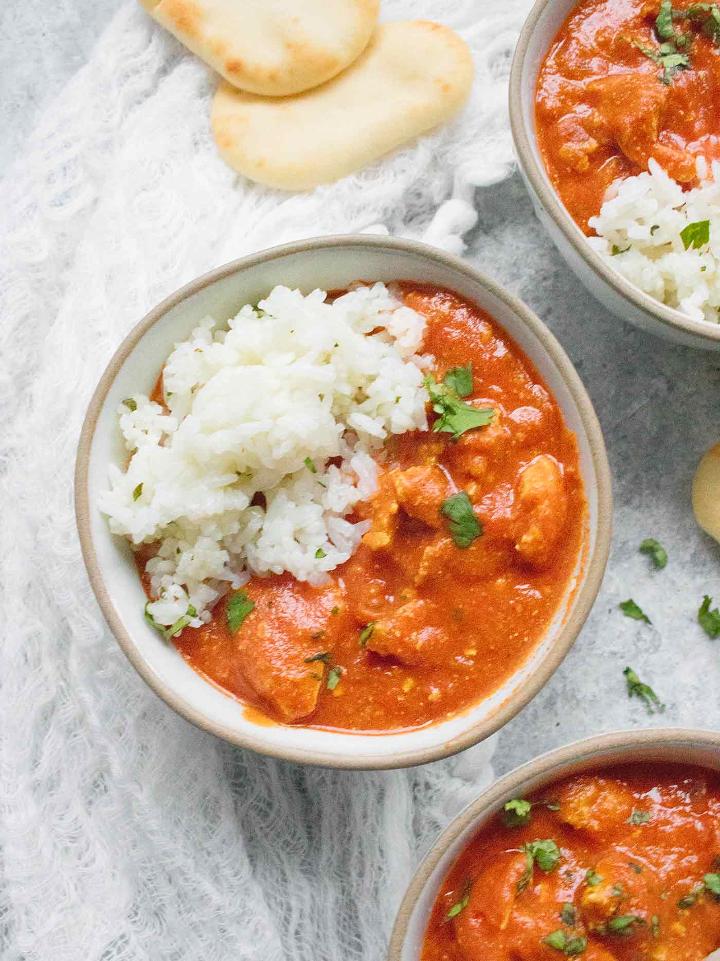 Chicken Tikka Masala served with rice in a bowl