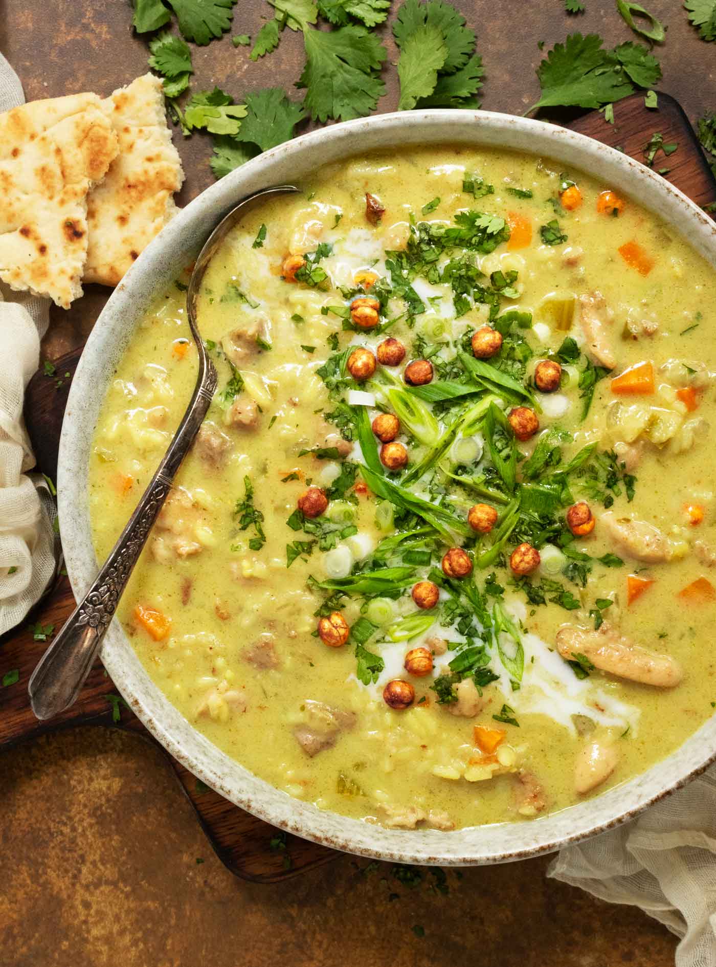 Overhead view of a bowl of Mulligatawny Soup.