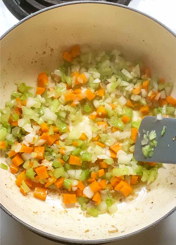 Sauteeing the soup aromatics.