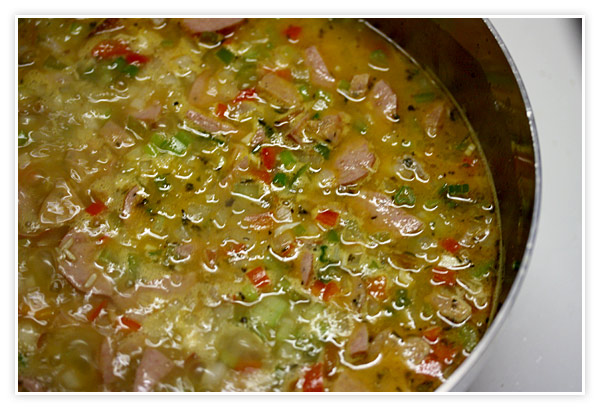 Close up of the jambalaya cooking in the pot.