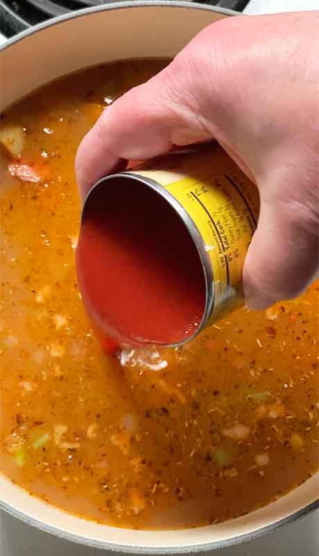 Adding the tomato sauce.