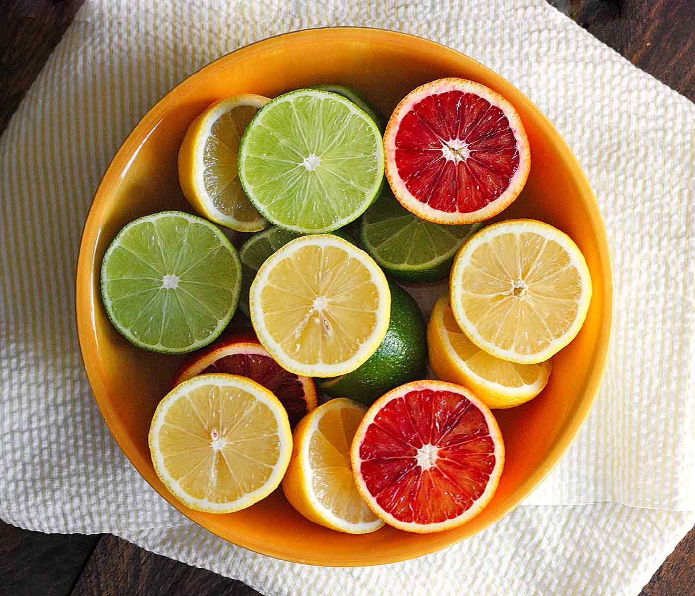 Lemons, limes and blood oranges ready to squeeze for homemade sour mix