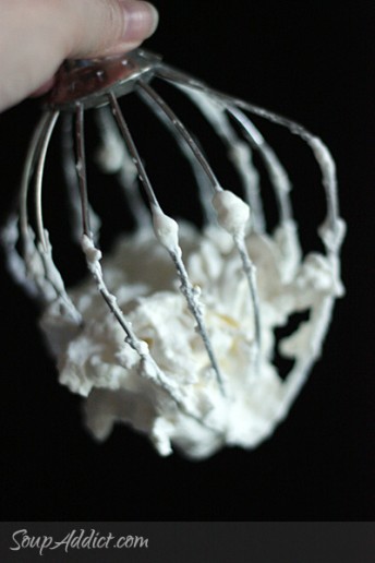 Whipped Cream on a whisk for Blueberry Fool dessert