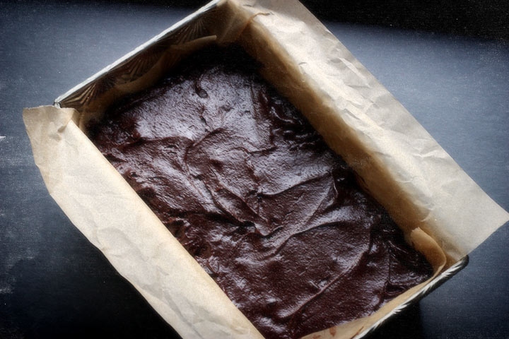 Chocolate Chocolate Chip Cake batter in a cake pan