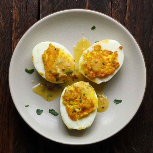 Three Fried Deviled Eggs on a Plate