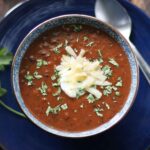 Overhead view of a bowl of Sriracha Black Bean Soup.