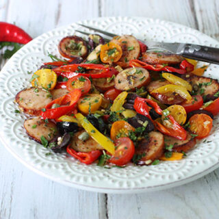 Frying Peppers, Cherry Tomatoes & Chicken Sausage Saute from SoupAddict.com - fresh, summer Jimmy Nardello frying peppers, cherry tomatoes, and chicken sausage sauteed up with olives, capers, and herbs for a quick delish dish.