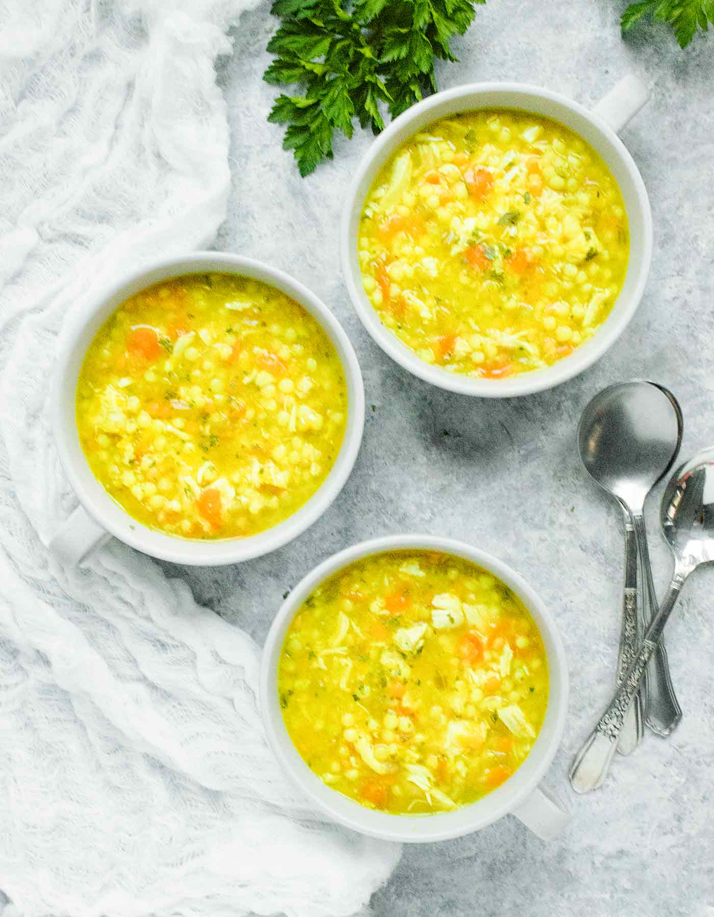 Three bowls of Cold-Fighting Couscous Chicken Soup
