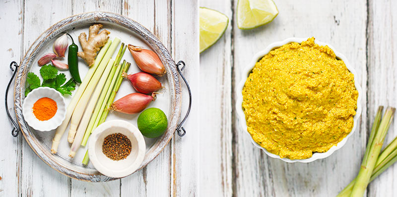 Ingredients for the curry paste arranged on a wooden platter.