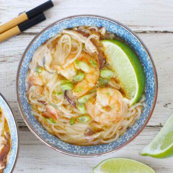 Thai Curry Shrimp Soup in a blue bowl.