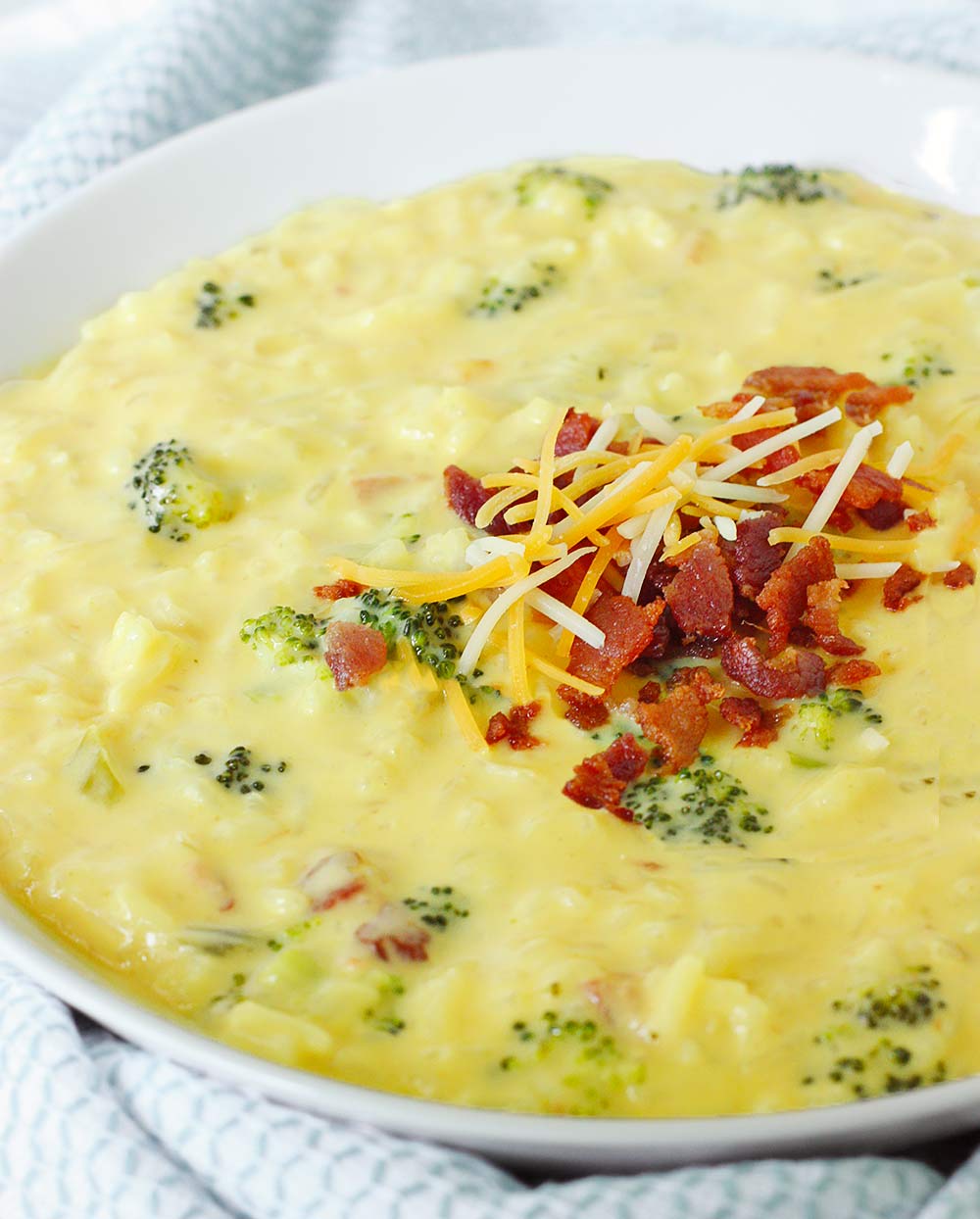 Close-up of a bowl of Cheesy Broccoli Rice Soup.