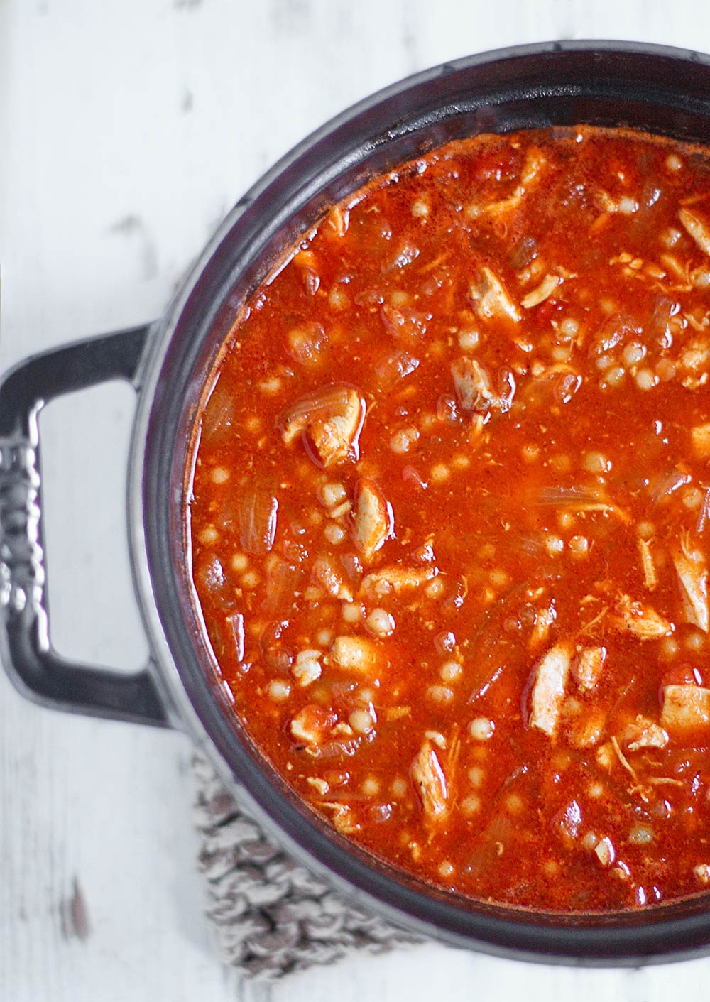 Overhead view of a pot of Moroccan Chicken Soup.