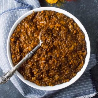 Curried Lentil Stew - with just seven ingredients you probably already have in your pantry, the best and easiest lentil stew is just 30 minutes away. Make-ahead awesome, simple, and satisfying. Recipe at SoupAddict.com
