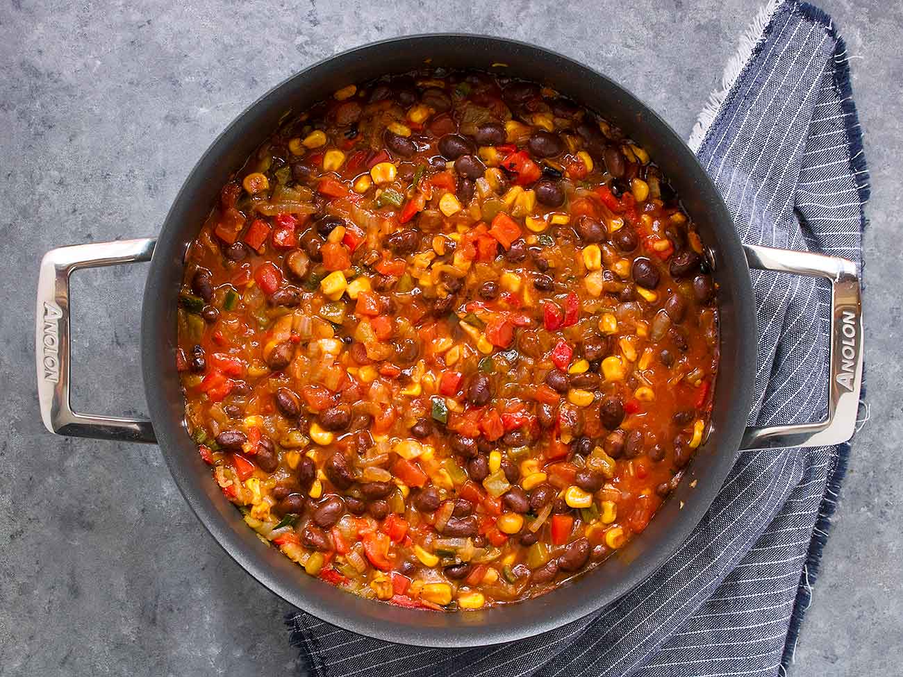 Mexican chili cooking in a pot.