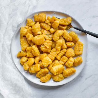 Pumpkin Gnocchi on a plate, ready to serve