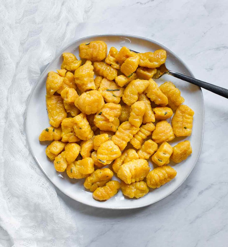 Pumpkin Gnocchi on a plate, ready to serve