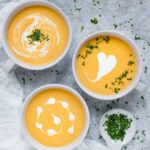 Three bowls of Carrot Lemongrass soup