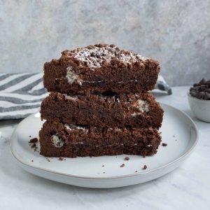 Chocolate Marshmallow Shortbread Bars stacked on a plate
