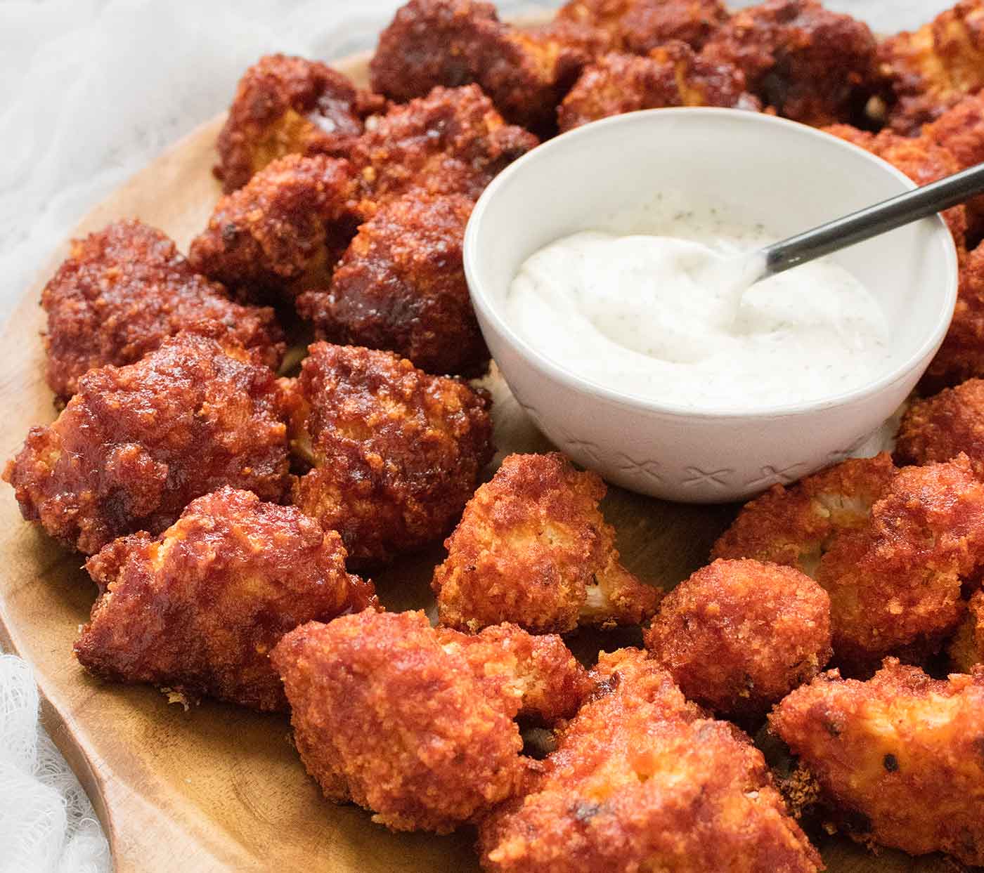 Sweet & Spicy Cauliflower Bites served with ranch dipping sauce