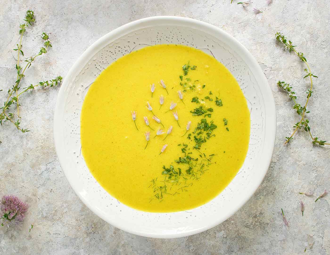 Spring Cauliflower Fennel Soup in a white bowl