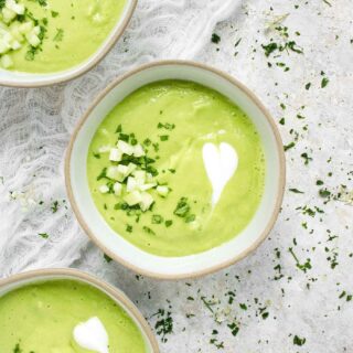 Three bowls of Spicy Green Goddess Gazpacho