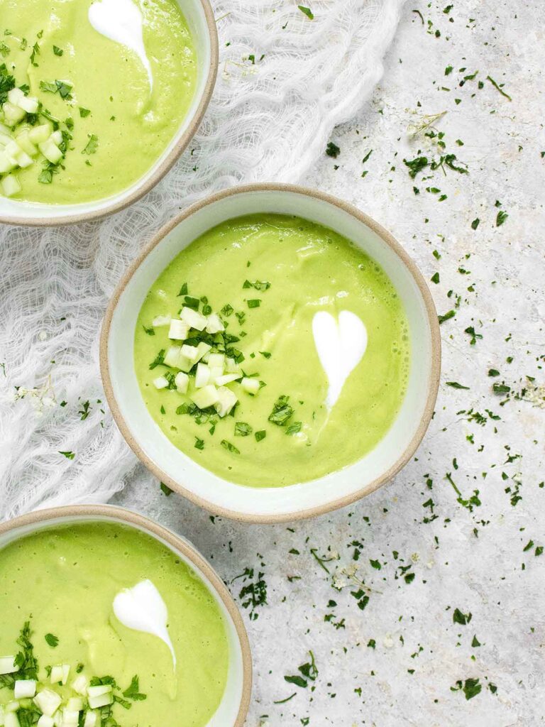 Three bowls of Spicy Green Goddess Gazpacho