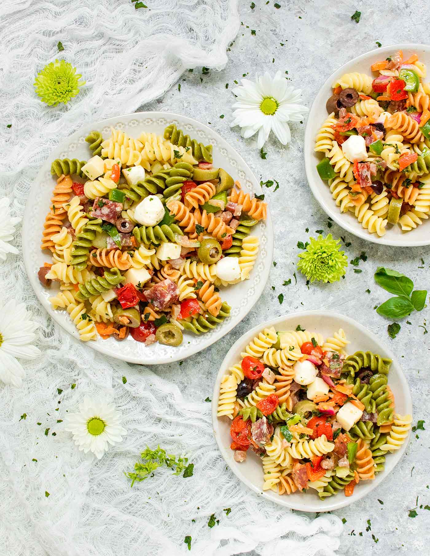 Three plates of Italian Pasta Salad