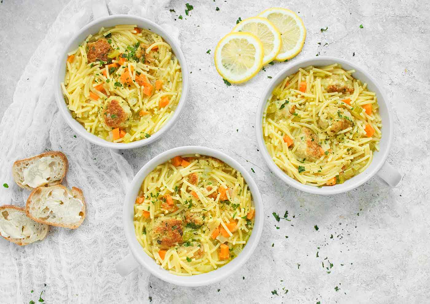 Three bowls of Chicken Meatball Noodle Soup