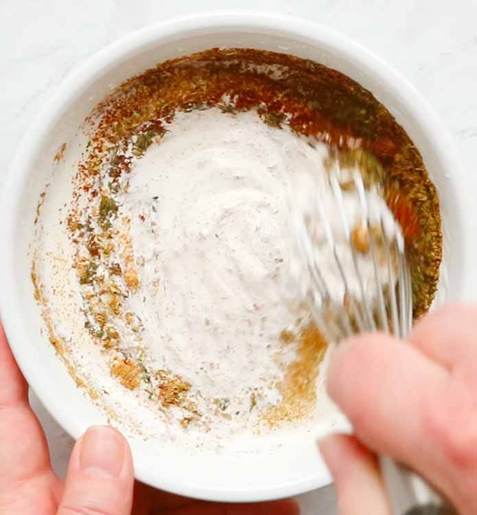 Whisking in the spices.