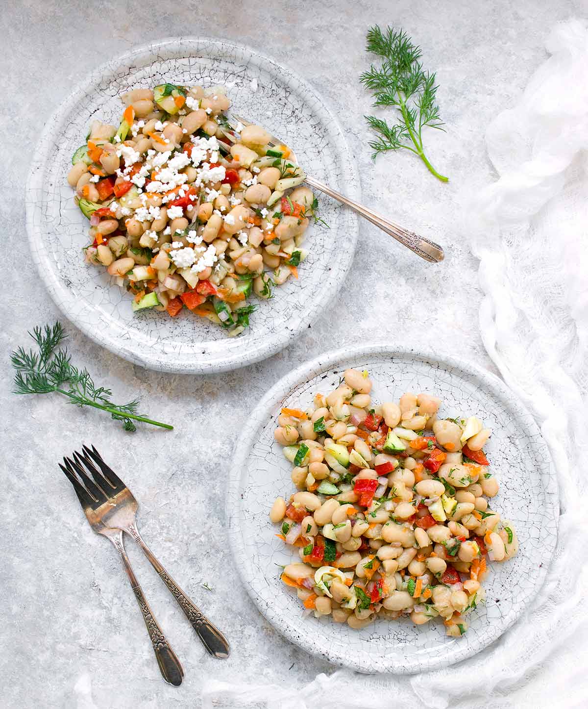 Herbed White Bean Picnic Salad on two white plates
