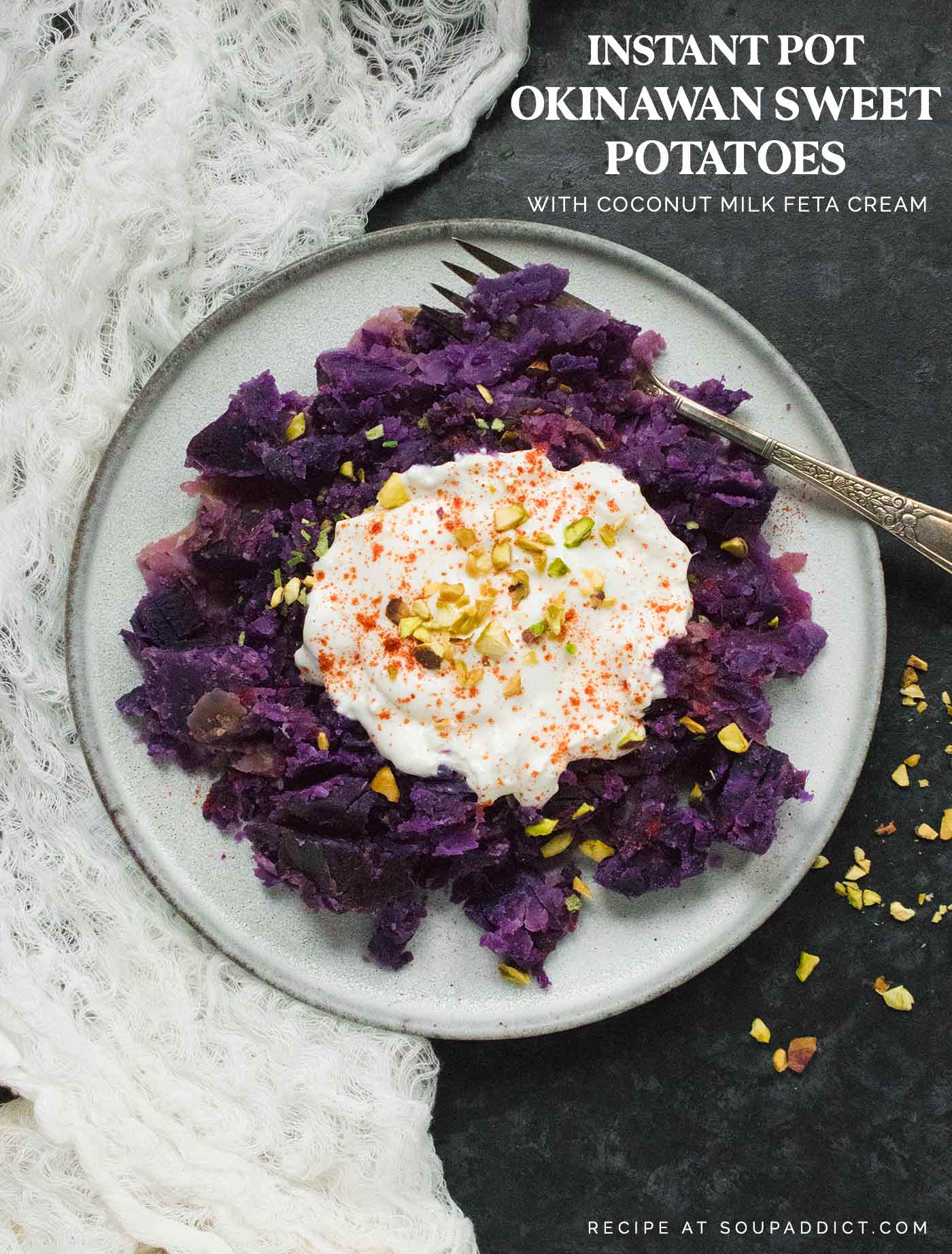 A plate of Okinawan Purple Sweet Potatoes, topped with creamy coconut milk and feta cheese.