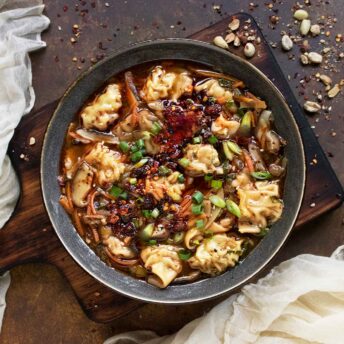 Potsticker Soup in a gray soup bowl.