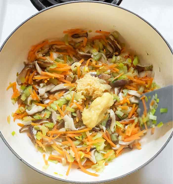 Finish the vegetable saute with some ginger and garlic.