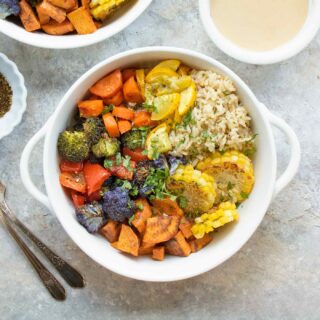 Mediterranean Vegetable Sheet Pan Dinner - roasted vegetables in a white bowl.