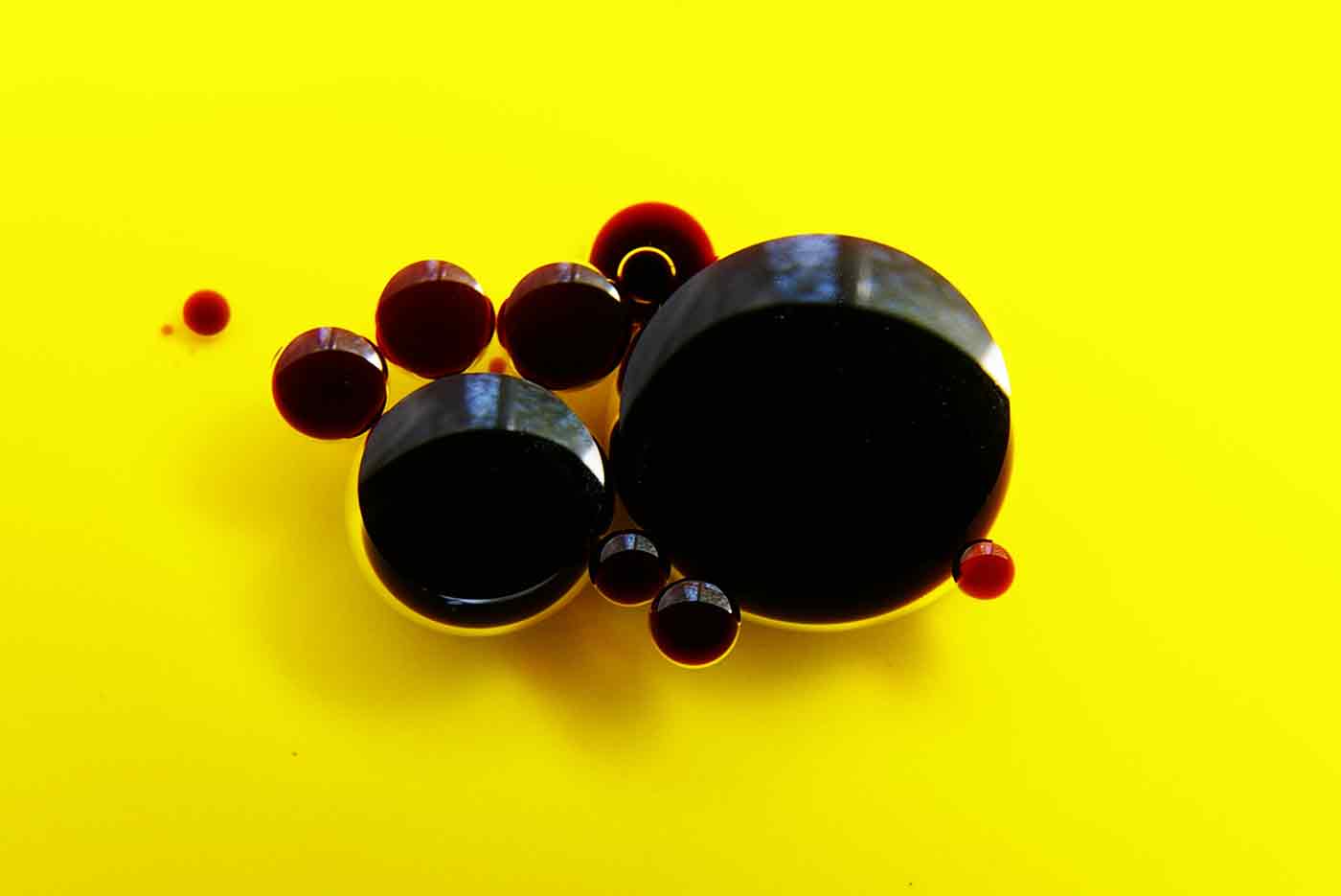 Vinegar droplets on oil.