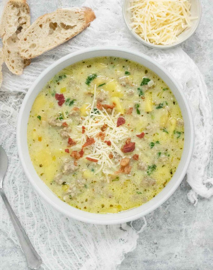 Tuscan Potato Soup in a light gray bowl.