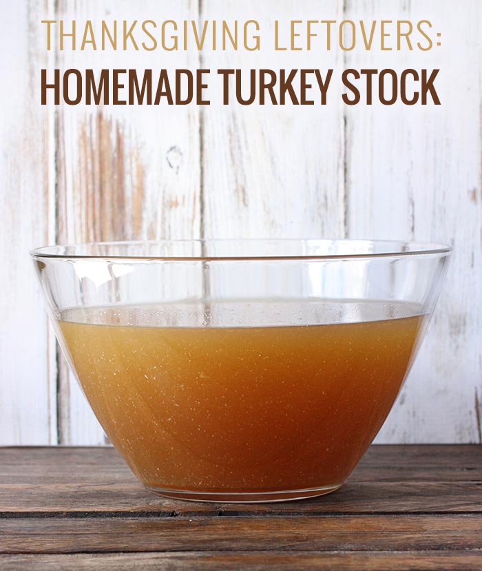 A glass bowl of homemade turkey stock.