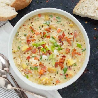 Overhead view of bowl of Chicken Potato Soup with Bacon.