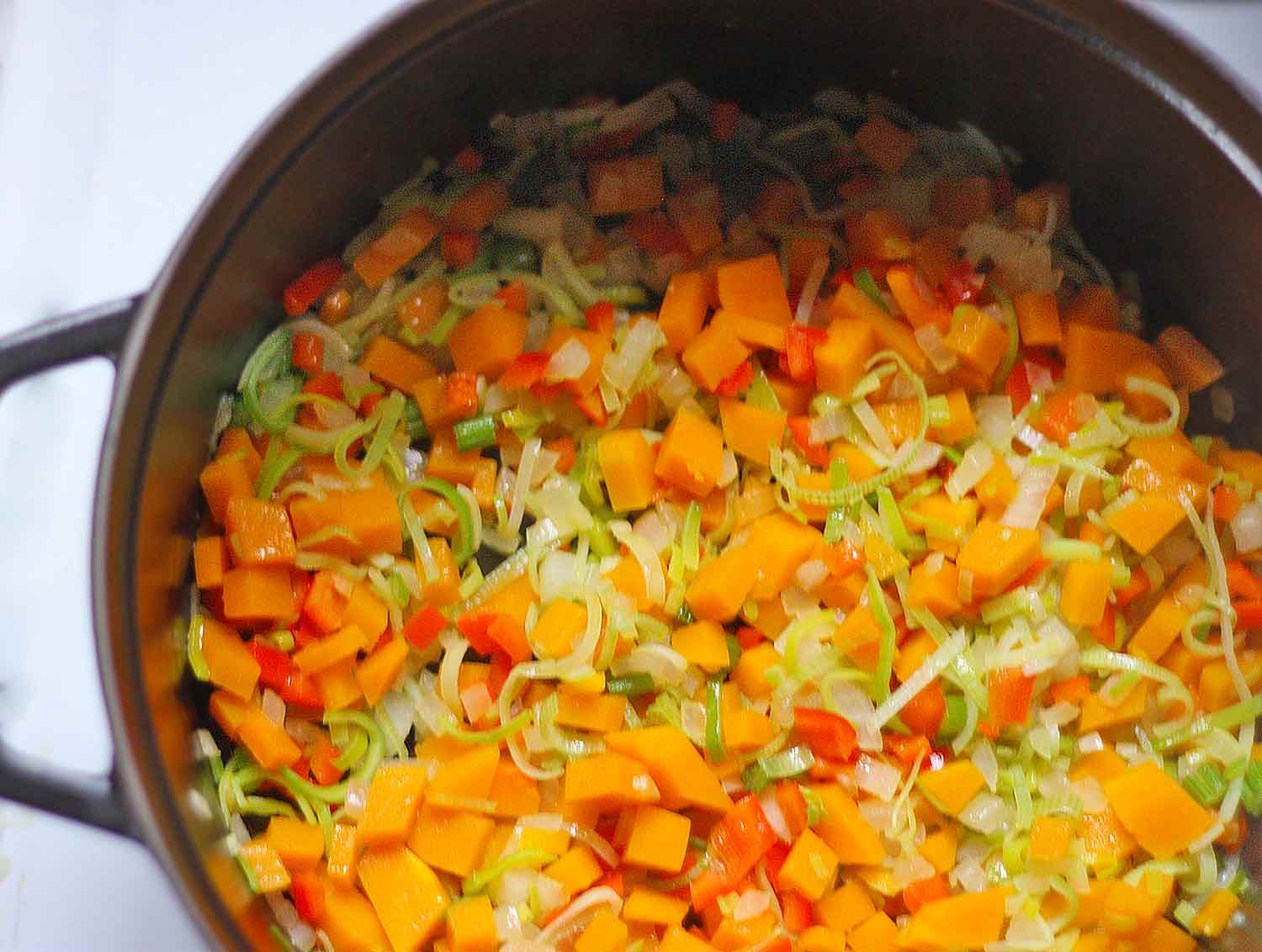 Aromatic vegetables simmering to flavorful goodness.