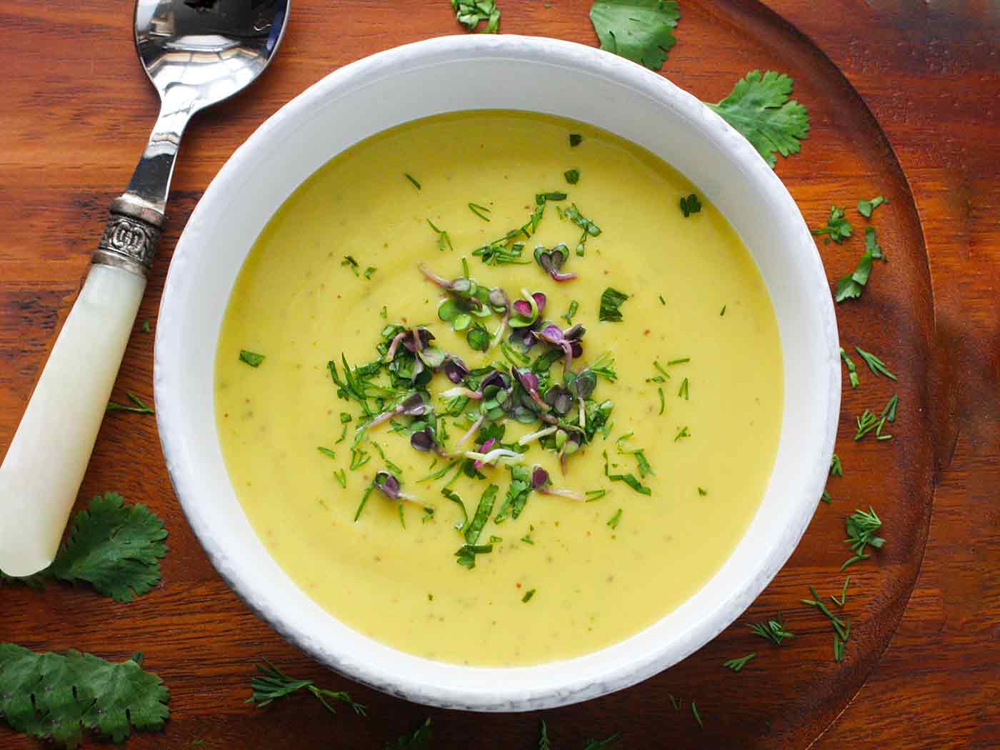 Overhead view of a bowl of Broccoli Cauliflower Soup.
