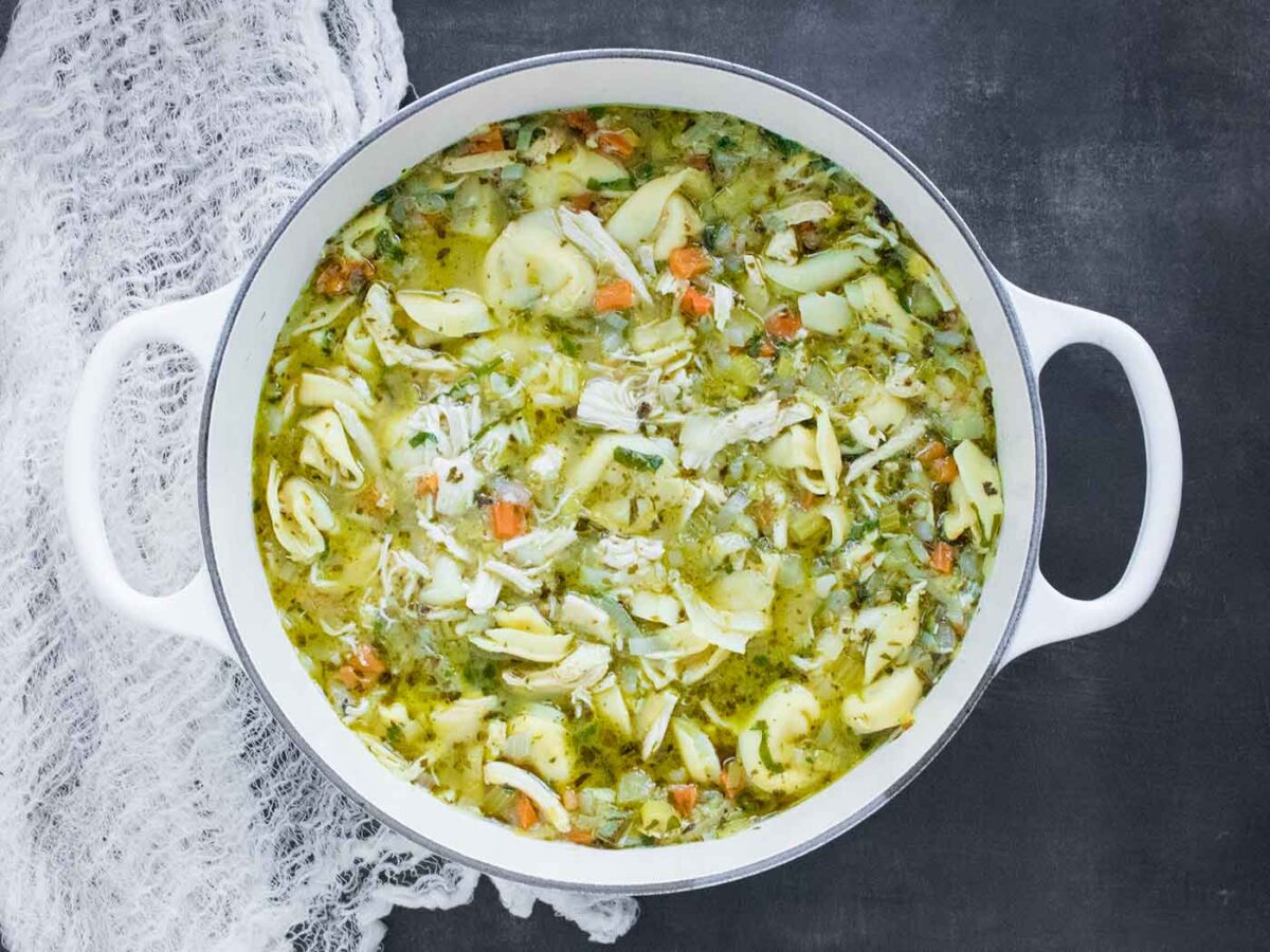 Overhead view of a pot of Rotisserie Chicken Tortellini Soup.