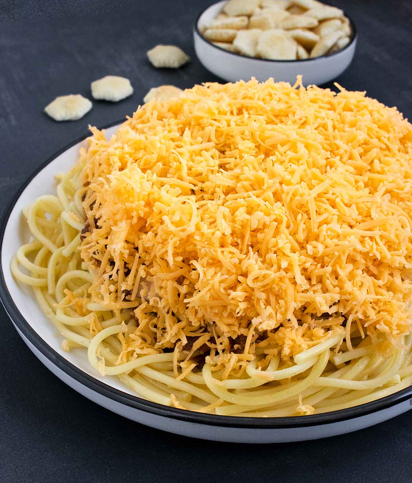 Side view of a plate of Cincinnati Chili spaghetti.