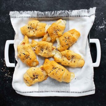 Mortadella Stuffed Crescent Rolls on a serving plate.