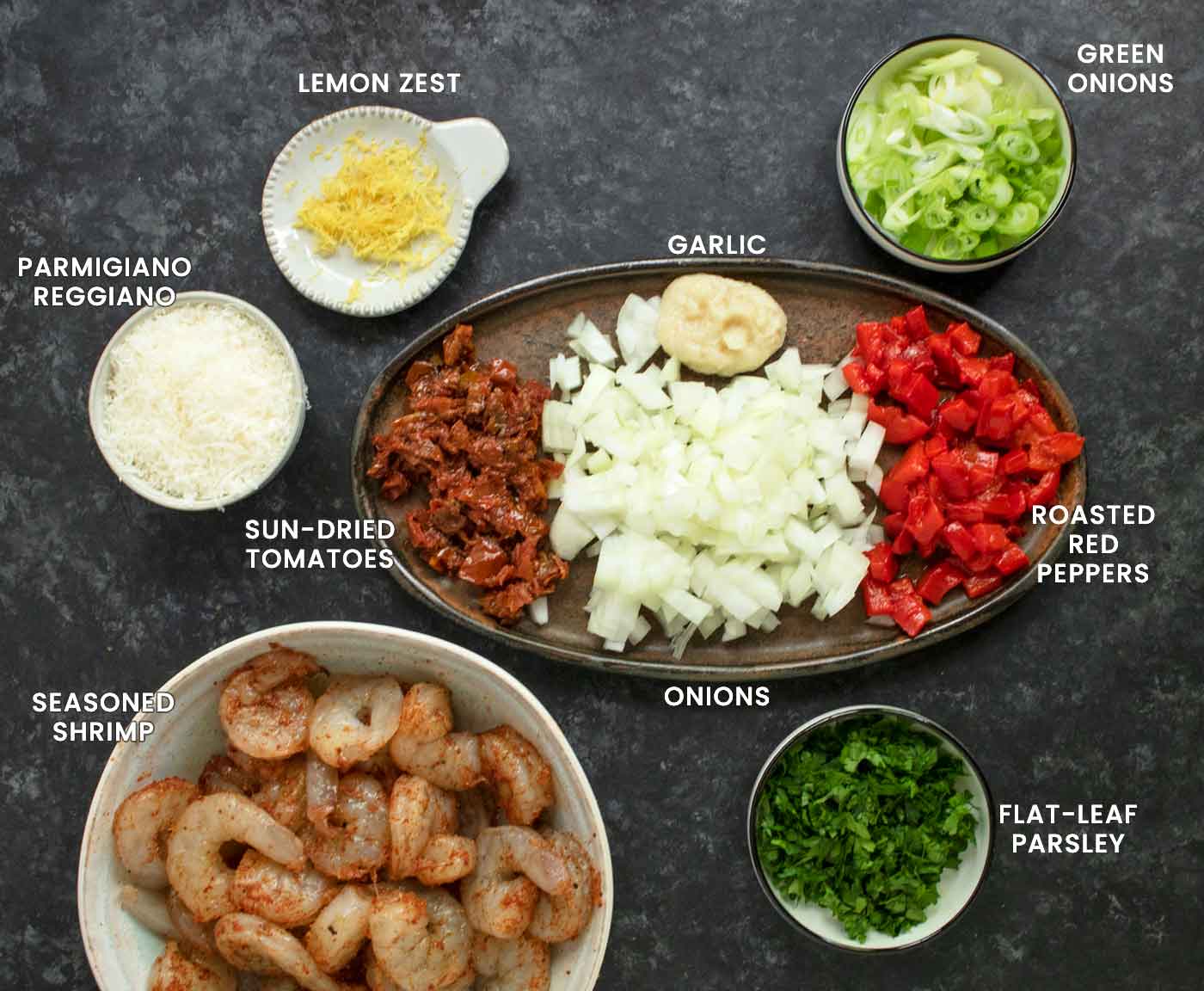 Prepared ingredients for Marry Me Shrimp and Orzo on a board.