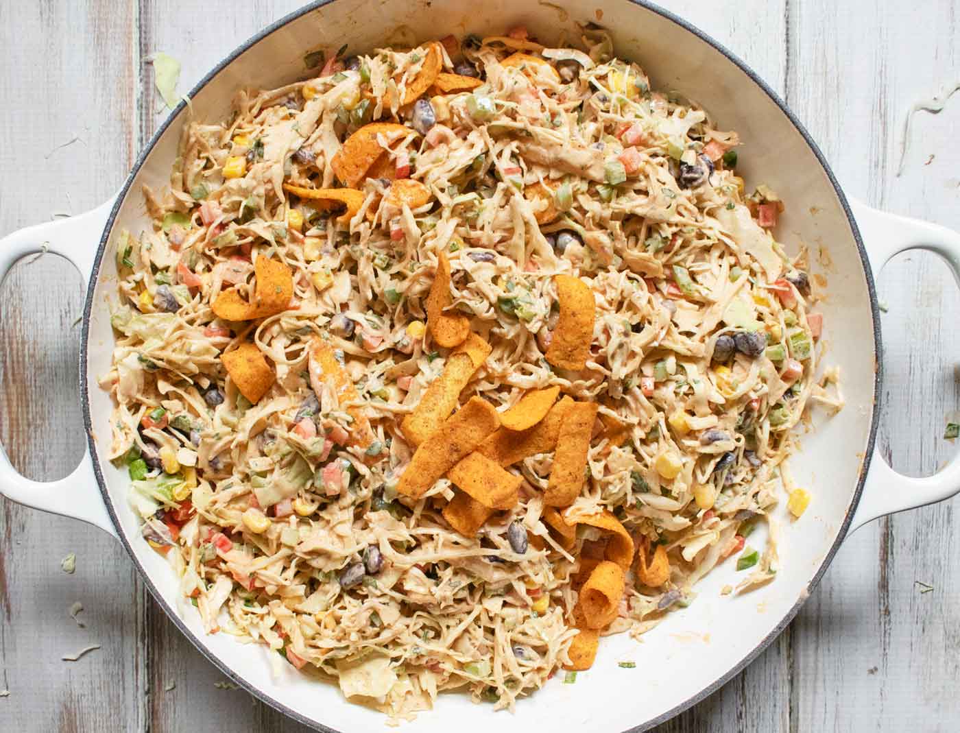 The slaw, ready to serve, topped with Chili Cheese Fritos.