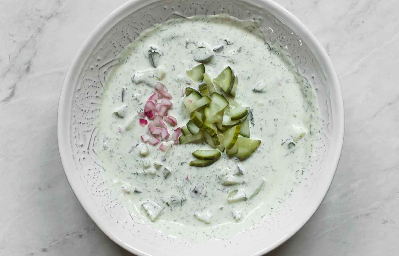 Pickles and red onions mixed into the dressing.