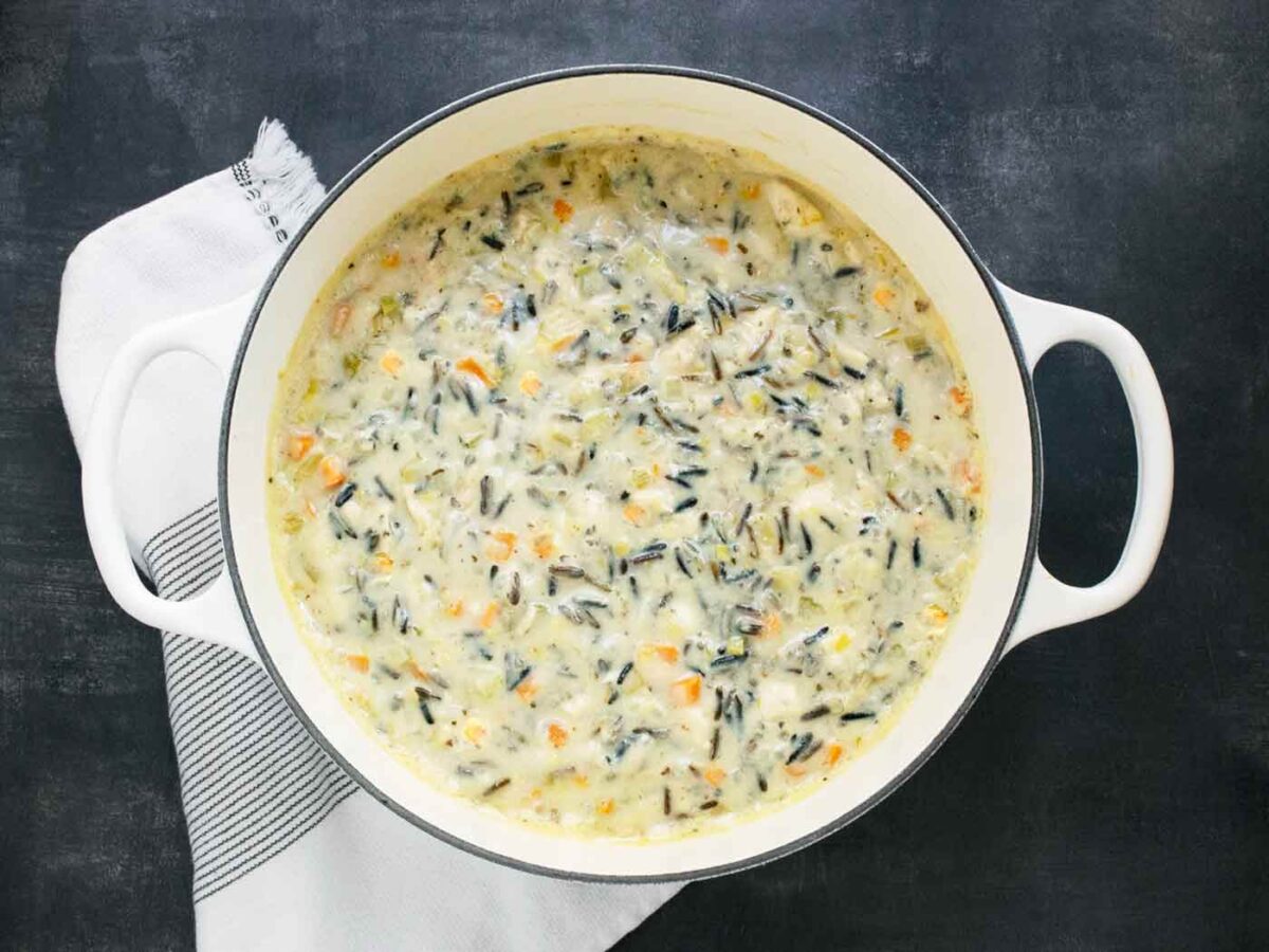 Overhead shot of Creamy Chicken Wild Rice Soup in a large Dutch oven.