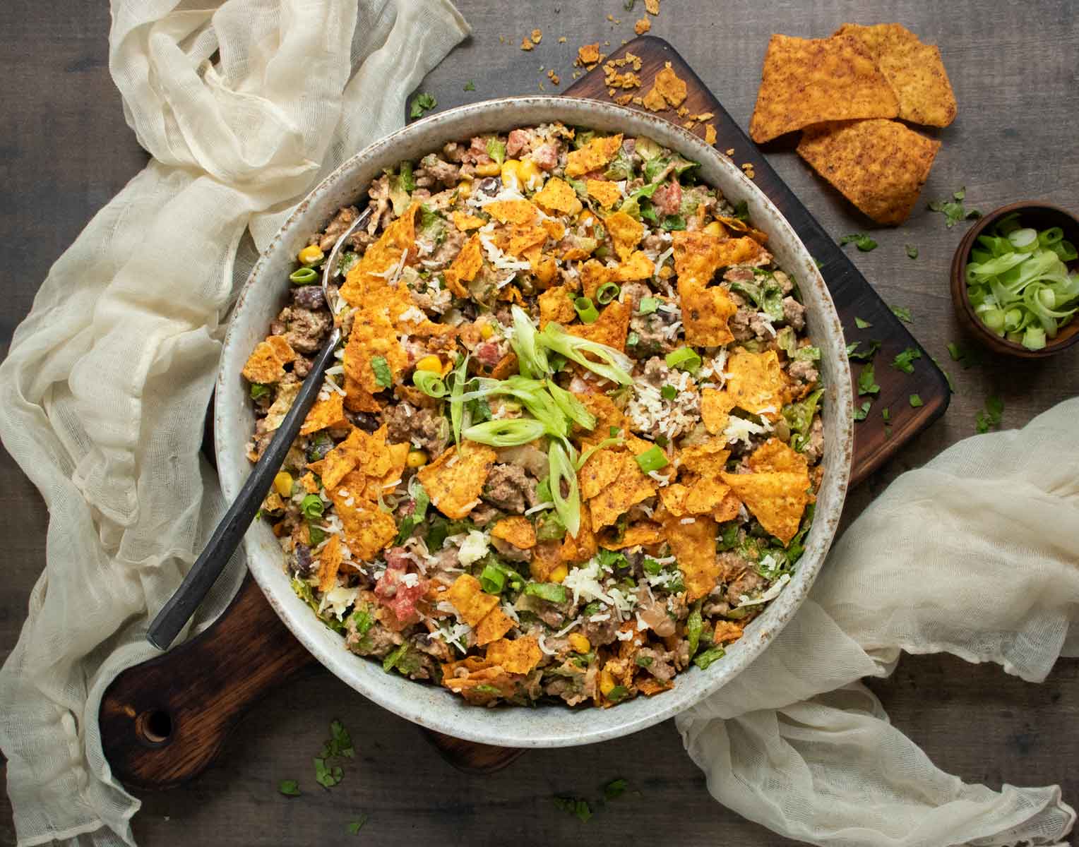 Doritos Taco Salad in a bowl with a fork.