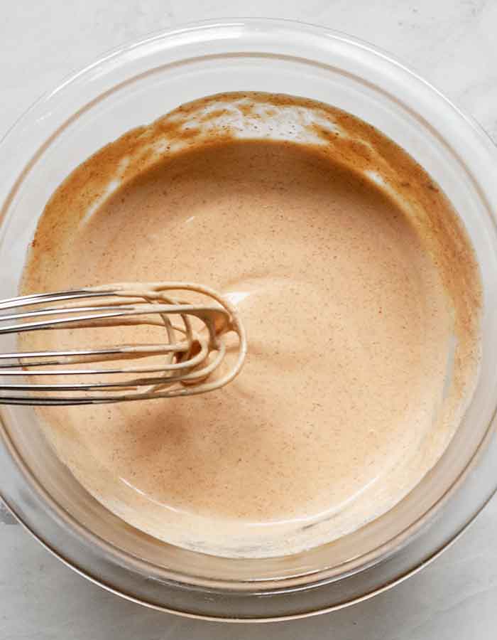 The taco salad dressing whisked and ready to serve.